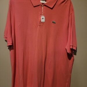 Lacoste polo shirt, pink, size 4x(fits small), small tear lower right